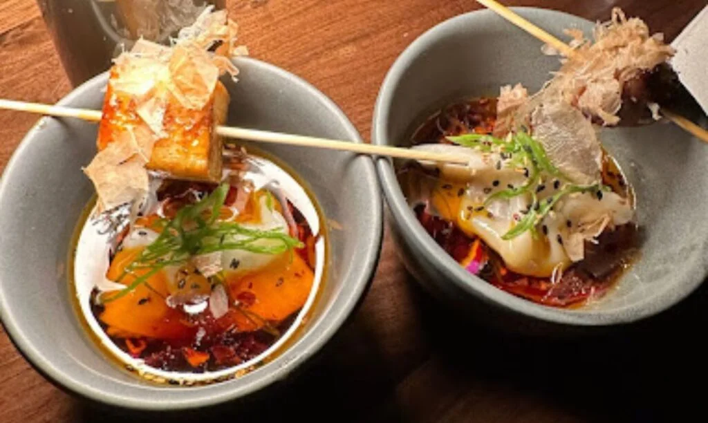 Two bowls of food from Agni in Columbus, OH