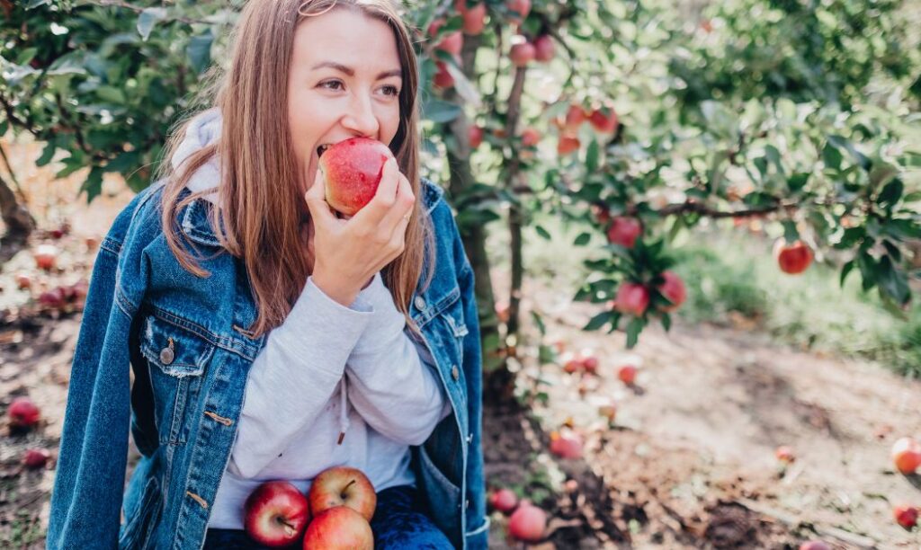 Woman eating an apple