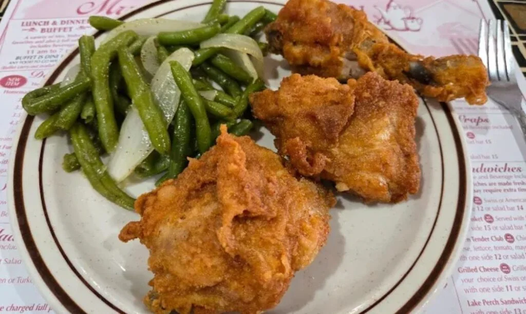 Fried chicken and green beans with onions from Mrs. Yoder's Kitchen
