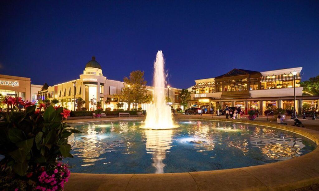 The fountain at Easton Town Center with outlet stores in the background. 