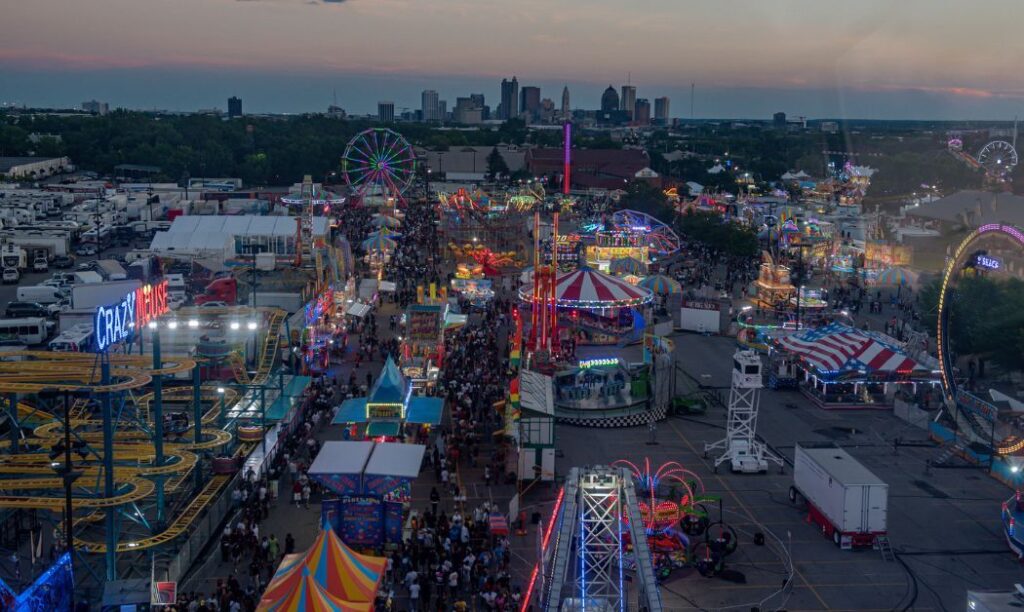 An aerial view of the Ohio State Fair with the skyline of Columbus, Ohio in the background.