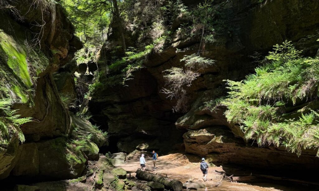 3 people exploring Conkle's Hollow Gorge in Southeast Ohio.