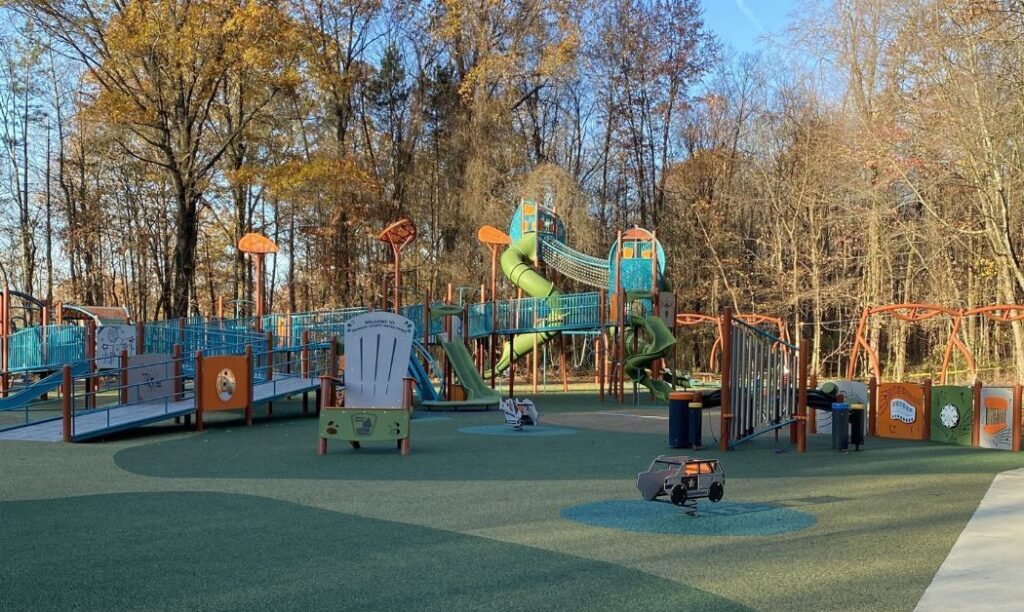 A wide shot of the expansive playground at Blendon Woods Metro park