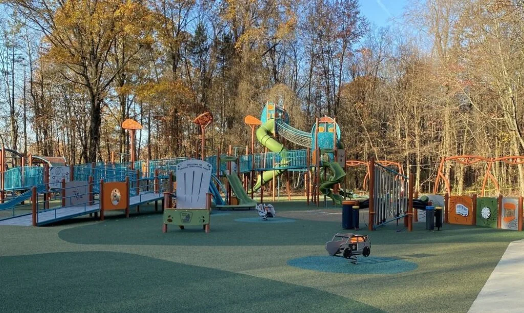 A wide shot of the expansive playground at Blendon Woods Metro park