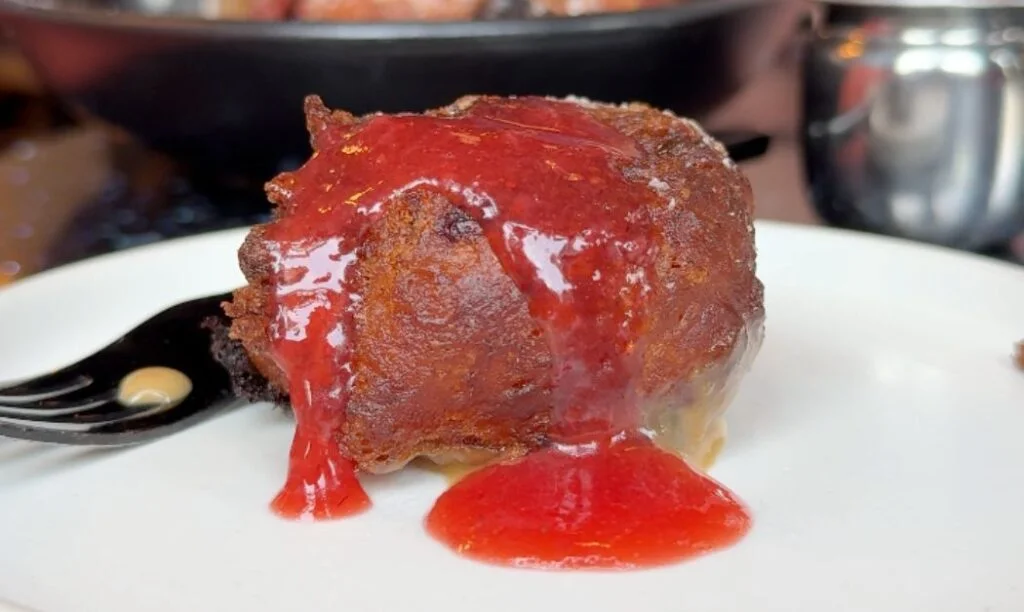 Spaceballs banana fritters with peanut butter fudge sauce and berry compote at The Mercury Diner