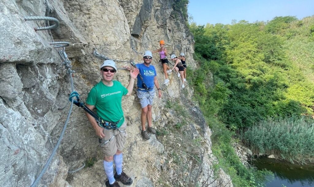 Climbers scaling a section of the cliffs at Quarry Trails Metro Park's via ferrata.