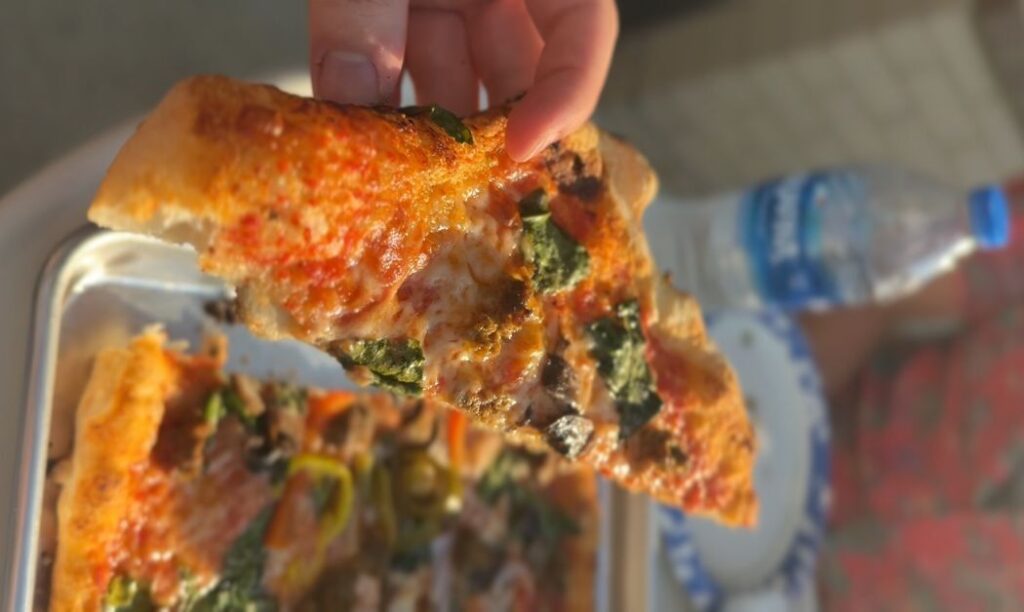 A uniquely shaped slice of the Chef Special.