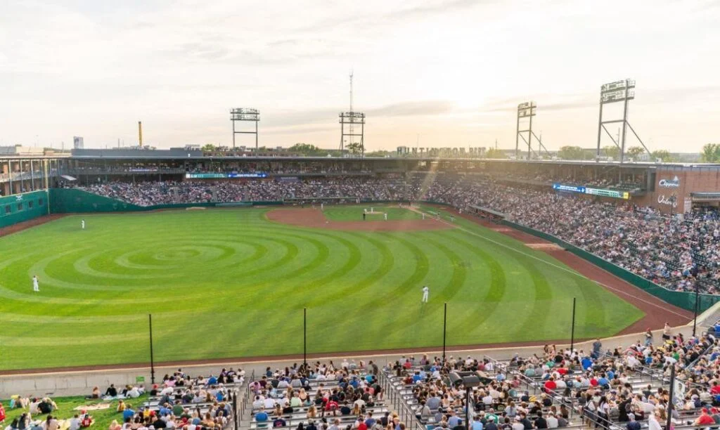 Huntington Park during a Columbus Clippers baseball game as the sun starts setting in the sky.