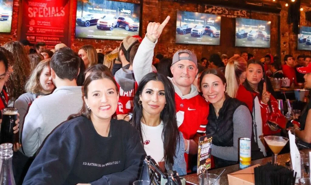 Ohio State fans cheering on the Buckeyes at Short North Pint House