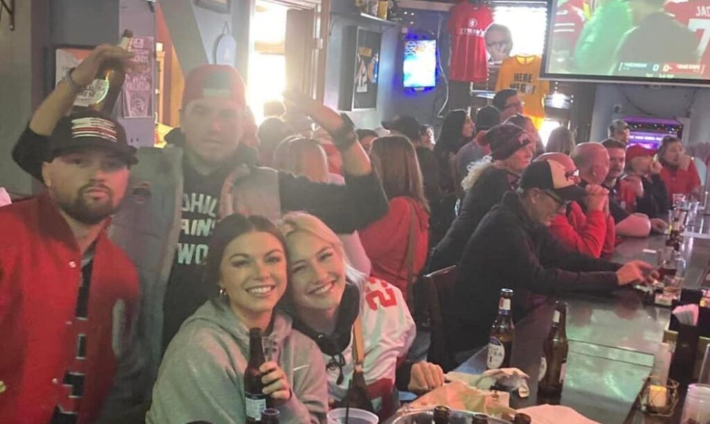 Buckeye fans cheering on the Buckeyes at Gresso's. 
