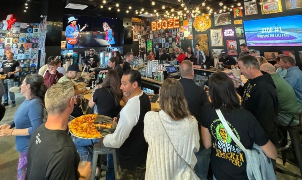 A crowd at Mikey's Late Night Slice's campus location