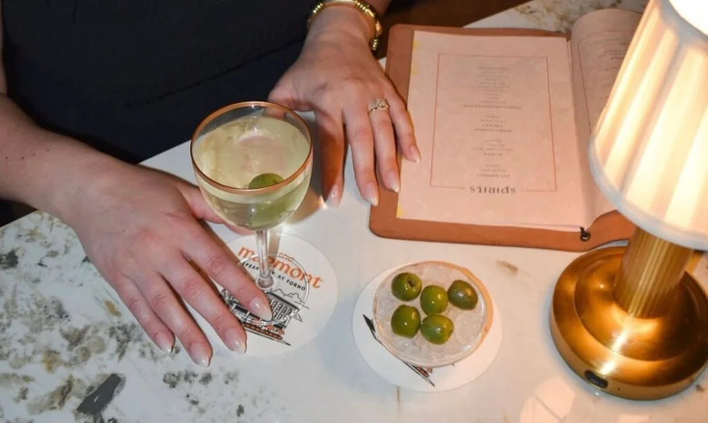 Drinking a martini with olives chilled on ice at The Marmont in the Short North.