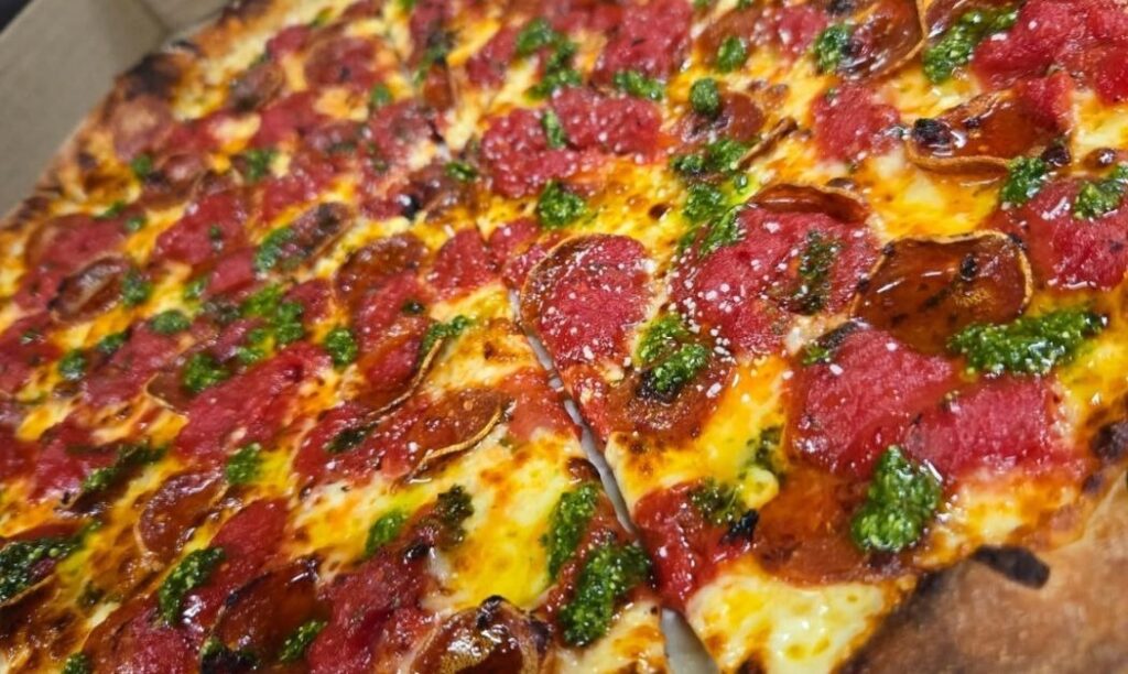 A pesto, cheese, and pepperoni pizza from Bazemore Pizza Co. in Upper Arlington, OH. 