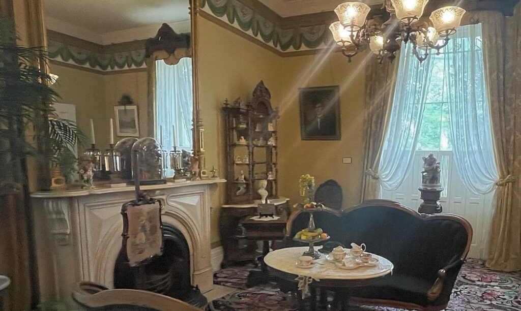 The Kelton House living room, present day (before the fire).