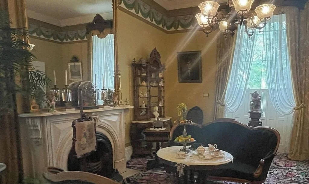 The Kelton House living room, present day (before the fire).