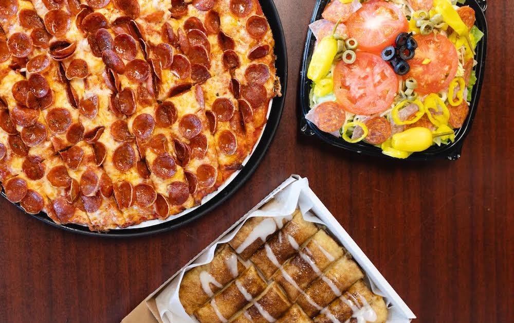Enter to Win the Famous Thin-Crust Pizza & Strombolis From Massey’s Pizza